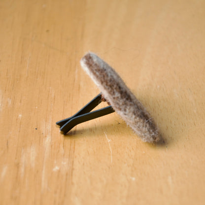 Needle felt air freshener in the shape of a brown heart