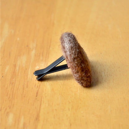 Needle felt air freshener in the shape of a rainbow