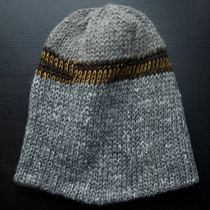 Knitted beanie on a dark background