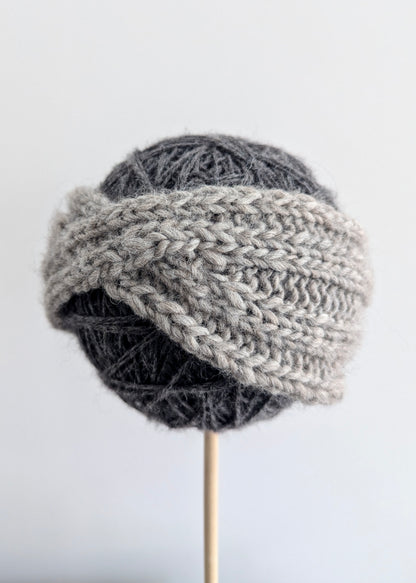 Knitted headband on a white background
